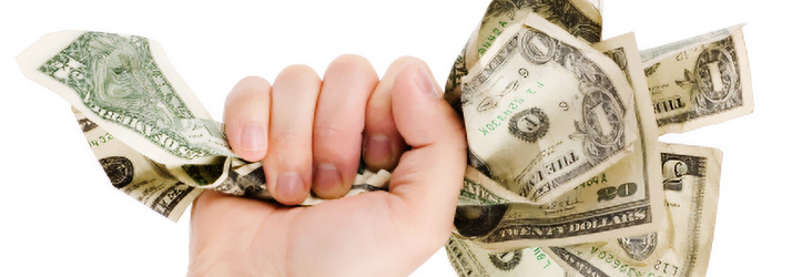 Chiropractic-Burbank-CA-Fist-Holding-Various-Paper-Money-Bills.jpg low back pain relief with chiropractic care